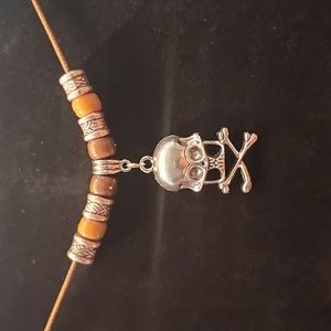 Silver Skull w/ Crossbones Brown Necklace